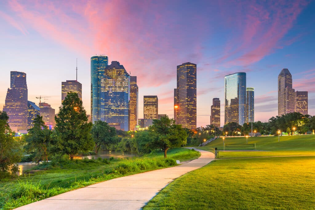 Houston, Texas, USA downtown city skyline and park at dawn. Home Care in Houston TX